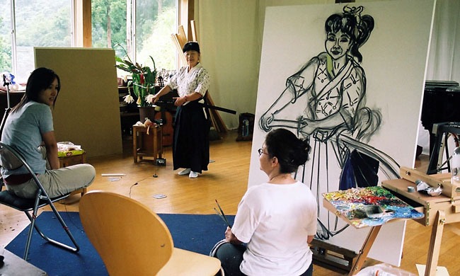 Studio with painter and subject