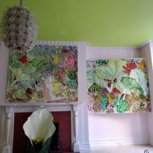 Living room with paintings and light green ceiling