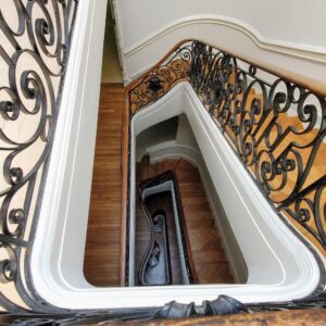 Ornate banister down stairs