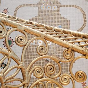Gold wicker chair detail