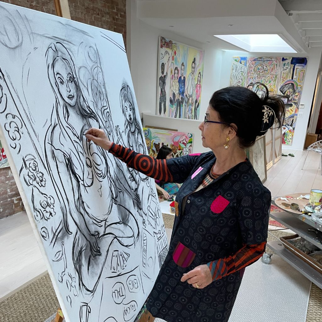 Vivian painting in studio
