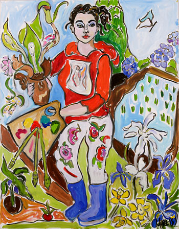 A woman in a red shirt painting